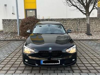 Second-hand BMW 114 102 CP (75 kW) 2014 Negru Hatchback