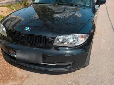 Gebraucht BMW 116 122 PS (89 kW) 2010 Schwarz Kleinwagen
