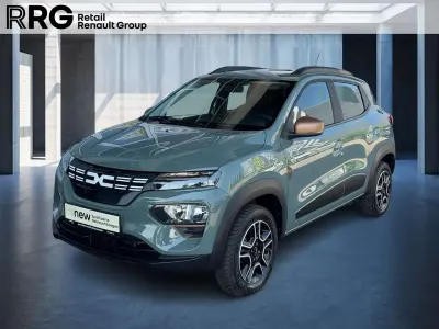 Gebraucht Dacia Spring Extreme 47 kW (65 PS) 2023 Grün flechtengrau Kleinwagen