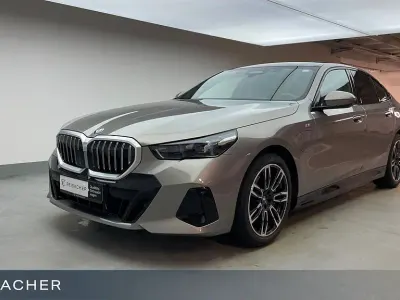 Gebraucht BMW 550e Comfort Edition 490 PS (360 kW) 2025 Oxidgrau ii metallic Limousine