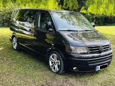 Second-hand VW T5 Highline 179 CP (131 kW) 2013 Negru Van