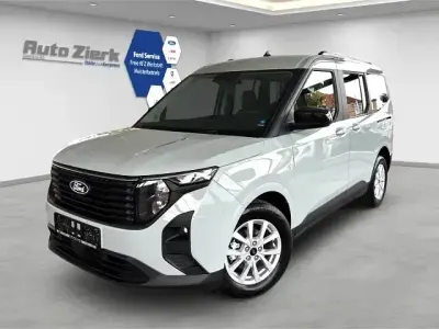 Gebraucht Ford Tourneo Courier Titanium 125 PS (91 kW) 2024 Grau Van / Kleinbus