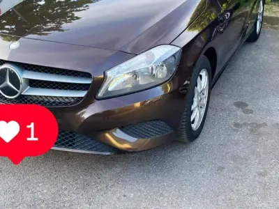 Używany Mercedes A160 106 KM (77 kW) 2015 Brązowy Hatchback