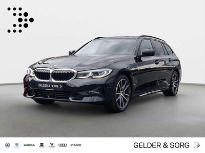 Second-hand BMW 330e Sport Line 292 CP (214 kW) 2021 Negru Break