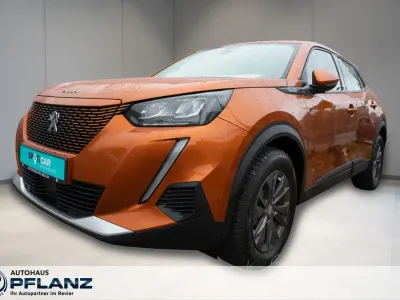 Second-hand Peugeot e-2008 Active 100 kW (136 CP) 2022 Portocaliu SUV