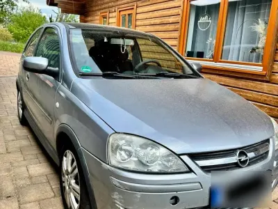 Używany Opel Corsa 80 KM (58 kW) 2006 Srebrny Hatchback