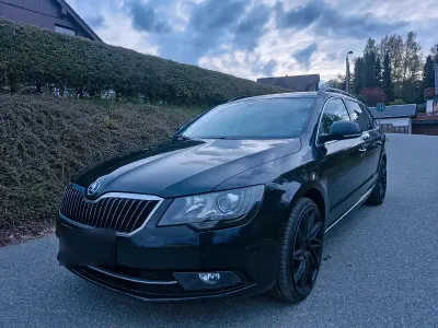Używany Skoda Superb 170 KM (125 kW) 2014 Czarny Kombi