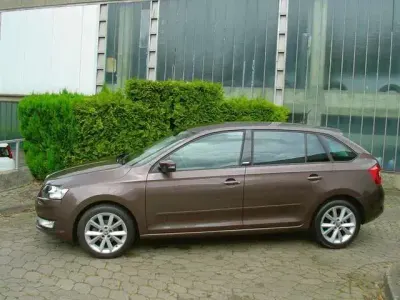 Gebraucht Skoda Rapid Joy 90 PS (66 kW) 2016 Topazbraun metallic Kombi