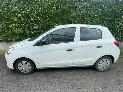 Gebraucht Mitsubishi Space Star 71 PS (52 kW) 2015 Weiß Kleinwagen