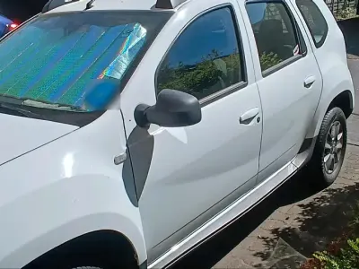 Second-hand Dacia Duster 105 CP (77 kW) 2014 Alb SUV