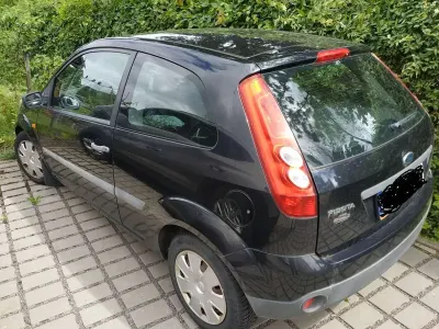 Gebraucht Ford Fiesta Ambiente 69 PS (50 kW) 2006 Schwarz Kleinwagen