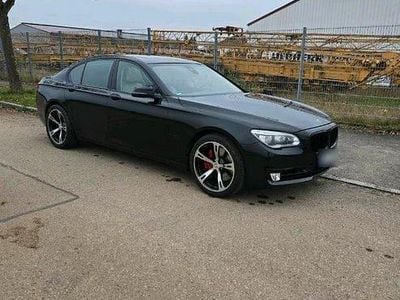 Second-hand BMW 750 381 CP (280 kW) 2012 Negru Berlinǎ