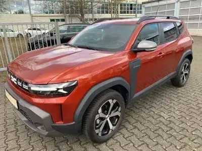 Używany Dacia Duster Journey 131 KM (96 kW) 2025 Brązowy SUV