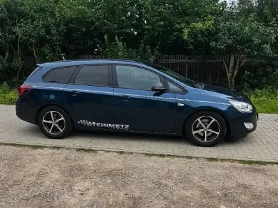 Gebraucht Opel Astra 125 PS (91 kW) 2011 Blau Kombi