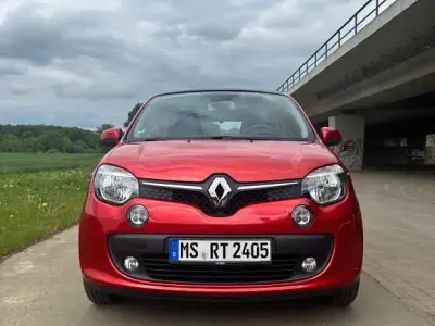 Używany Renault Twingo Luxe 90 KM (66 kW) 2014 Czerwony Hatchback