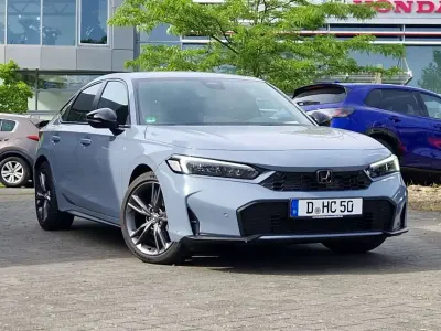 Gebraucht Honda Civic Hybrid 184 PS (135 kW) 2025 Sonic grey (grau) Limousine