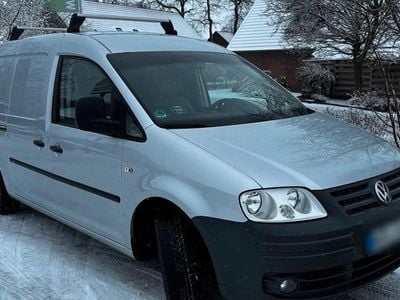 Second-hand VW Caddy Maxi 102 CP (75 kW) 2009 Argintiu Monovolum