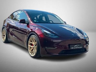 Second-hand Tesla Model Y Performance 392 kW (534 CP) 2023 Roșu SUV