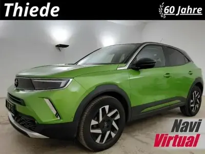 Gebraucht Opel Mokka Elegance 131 PS (96 kW) 2021 Matcha grün metallic SUV
