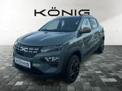 Gebraucht Dacia Spring Extreme 47 kW (65 PS) 2023 Grün "flechtengrau" Kleinwagen