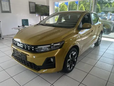 Neu Dacia Sandero Comfort 101 PS (74 kW) 2025 Amber yellow Limousine