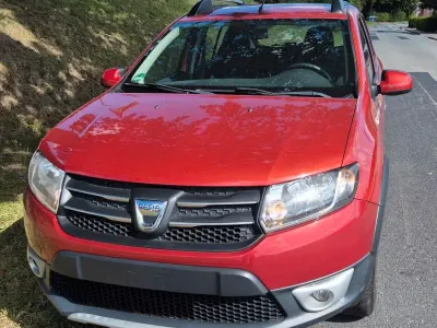 Gebraucht Dacia Sandero Prestige 90 PS (66 kW) 2016 Rot Limousine