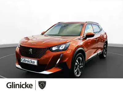 Gebraucht Peugeot e-2008 Allure 100 kW (136 PS) 2022 Metfa orange fusion SUV