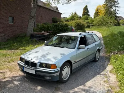 Gebraucht BMW 318 115 PS (84 kW) 1995 Silber Kombi