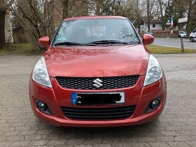Gebraucht Suzuki Swift Basic 94 PS (69 kW) 2011 Orange Kleinwagen