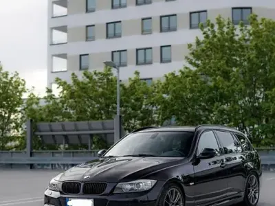 Second-hand BMW 330 Sport Line 245 CP (180 kW) 2011 Negru Break