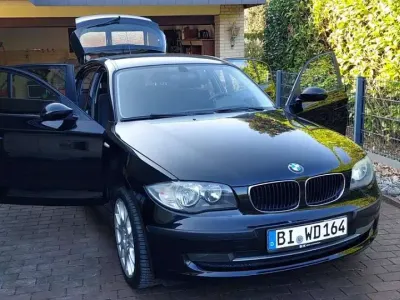Gebraucht BMW 116 122 PS (89 kW) 2008 Schwarz Kleinwagen
