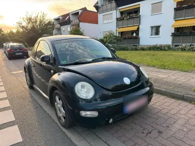 Gebraucht VW New Beetle 74 PS (54 kW) 1998 Schwarz Kleinwagen