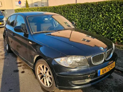 Używany BMW 116 140 KM (102 kW) 2011 Czarny Hatchback