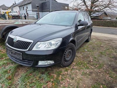 Second-hand Skoda Octavia Active 105 CP (77 kW) 2012 Negru Break