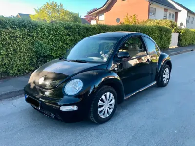 Gebraucht VW New Beetle 108 PS (79 kW) 1998 Schwarz Kleinwagen