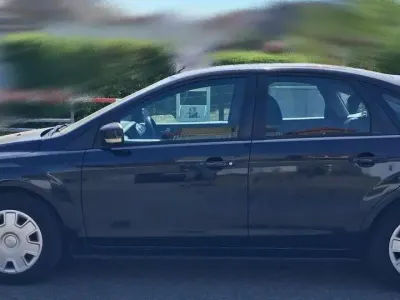 Gebraucht Ford Focus 101 PS (74 kW) 2010 Schwarz Limousine