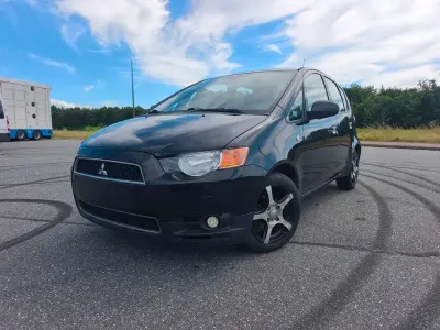 Gebraucht Mitsubishi Colt 95 PS (69 kW) 2011 Schwarz Kleinwagen
