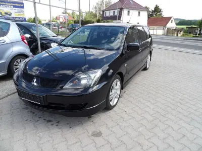 Gebraucht Mitsubishi Lancer Invite 98 PS (72 kW) 2009 Schwarz Kombi