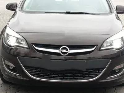 Gebraucht Opel Astra Exklusiv 110 PS (80 kW) 2014 Braun Limousine