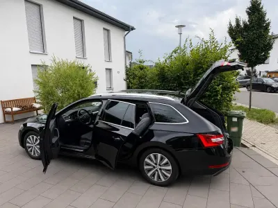 Gebraucht Skoda Superb 218 PS (160 kW) 2021 Schwarz Kombi