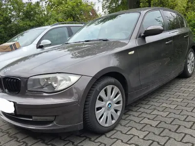 Używany BMW 116 122 KM (89 kW) 2009 Brązowy Hatchback