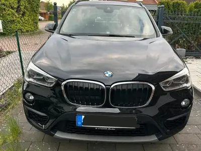 Używany BMW X1 Advantage 150 KM (110 kW) 2016 Czarny SUV