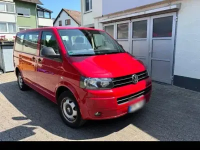 Używany VW T5 140 KM (102 kW) 2011 Czerwony Van