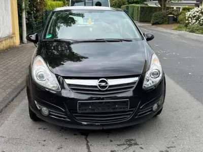 Używany Opel Corsa Eco 80 KM (58 kW) 2010 Czarny Hatchback