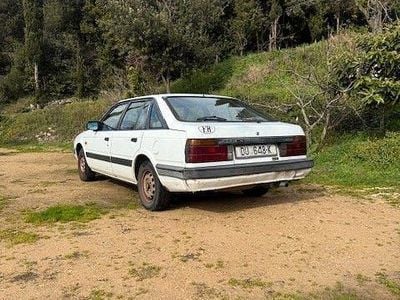 Second-hand Mazda 626 63 CP (46 kW) 1987 Alb Berlinǎ