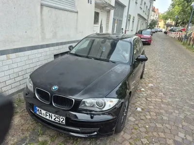 Gebraucht BMW 116 122 PS (89 kW) 2009 Schwarz Kleinwagen