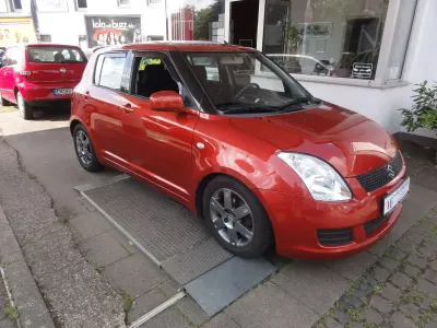 Gebraucht Suzuki Swift Snow 92 PS (67 kW) 2009 Orange Kleinwagen