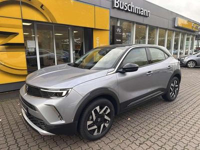 Gebraucht Opel Mokka-e Elegance 100 kW (136 PS) 2022 Kontrast grau metallic SUV