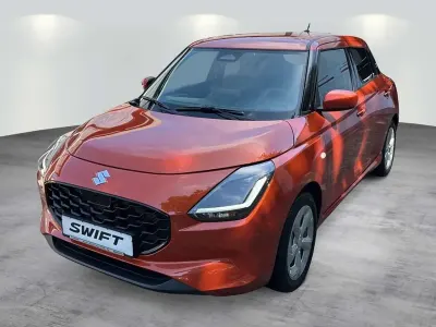 Neu Suzuki Swift Comfort 83 PS (61 kW) 2026 Flame orange pearl metallic Limousine