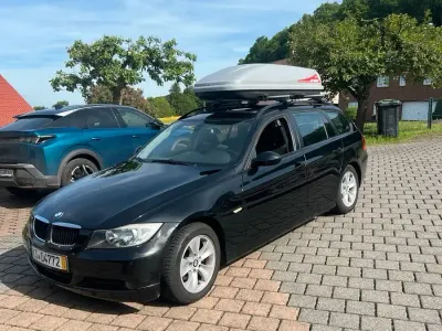 Gebraucht BMW 318 129 PS (94 kW) 2007 Schwarz Kombi
